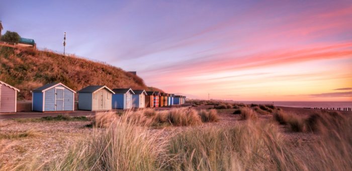 RP Early morning sunrise photo of a group of beach huts on Pakefield Beach in Lowestoft, Suffolk L shutterstock_1201595851 | Garrington East Schools in Suffolk