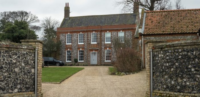 RP Flint walls entrance to big house shutterstock_1317389285 | Garrington East Living in North Norfolk